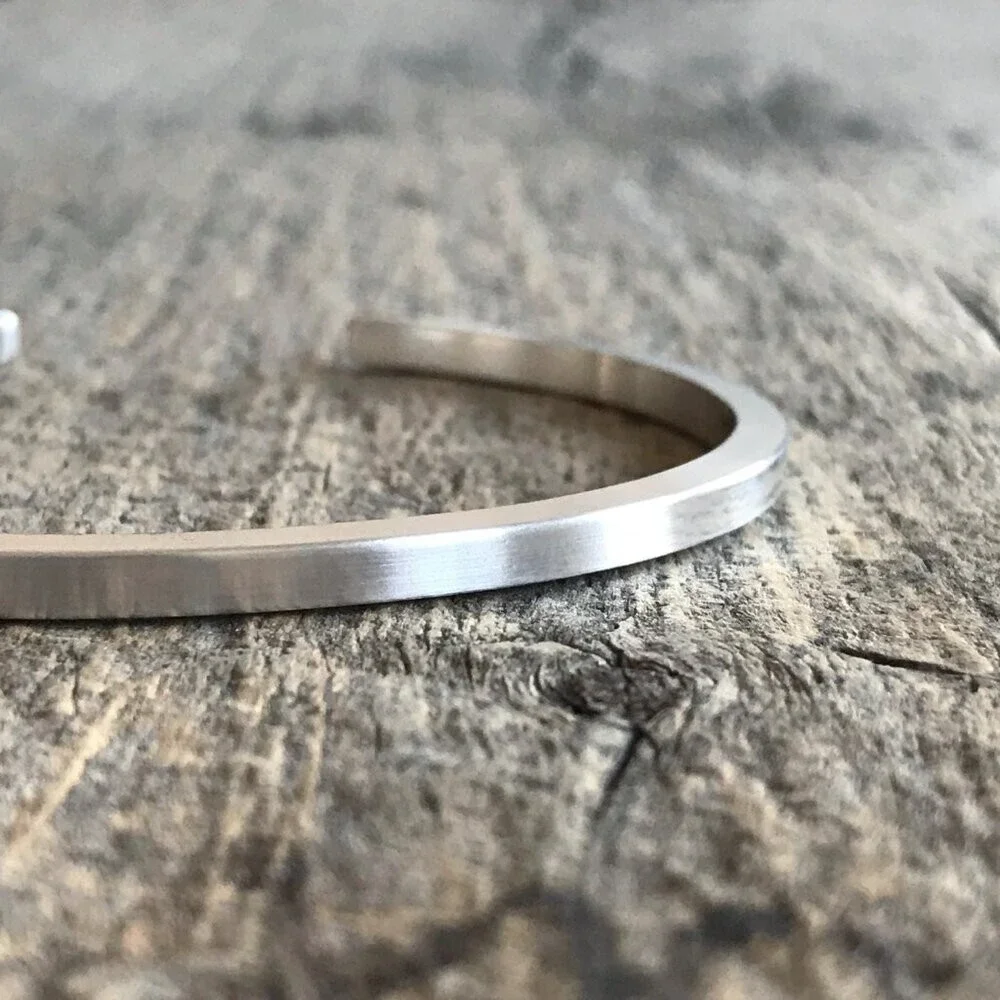 Brushed sterling silver square open cuff bangle bracelet.